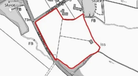 A map showing an area in red and roads in grey, including Church Road next to the red area.