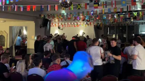 England fans gathered at a pub in Baddeley Green