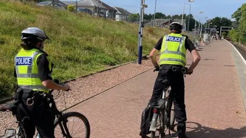 Police Scotland officer at balloch on bikes