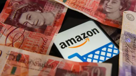 Getty Images Amazon logo surrounded by money