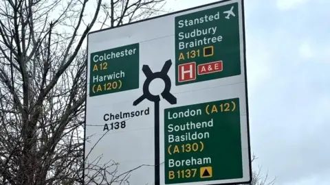LAUREN CARTER/BBC Road sign on the A131 on the outskirts of Chelmsford