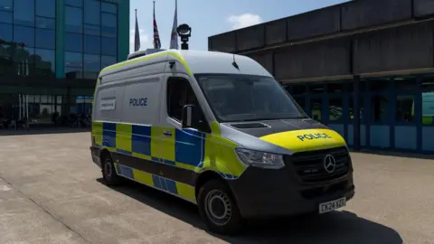Nottinghamshire Police A police facial recognition van, which has hi vis markings and a camera on a pole on the roof