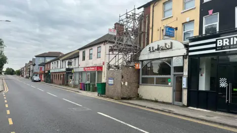 Tony Fisher/BBC A view of the scaffolding on the high street