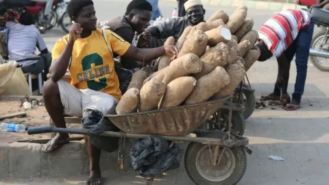 EPA A yam seller in Lagos, Nigeria - Wednesday 8 February 2023