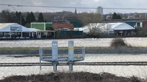 Flooded railway line in Rotherham