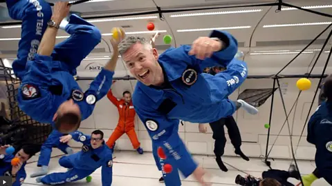 John McFall floats while experiencing zero gravity