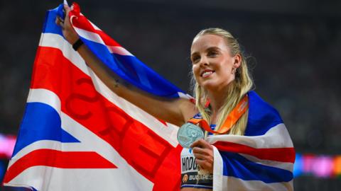 Keely Hodgkinson celebrates with her world silver medal