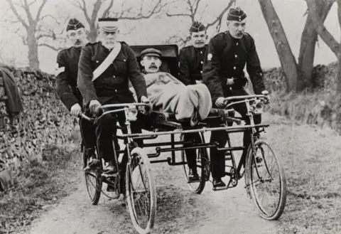 St John Ambulance A man in a cycle ambulance from the 1910s
