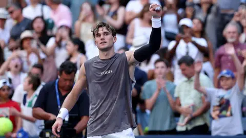 Getty Images Jack Draper of the United Kingdom reacts to match point.