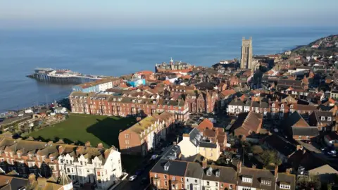 Martin Barber/BBC Aerial view of Cromer looking over the Norfolk seaside town towards the coast.