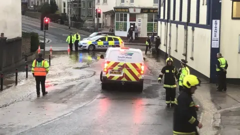 Road flooded by Wolseley Road.