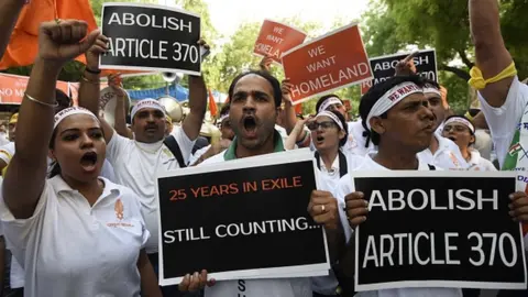 Getty Images Kashmiri Pandits community holding a rally on World Refugee Day in New Delhi, demanding separate homeland within Kashmir at Jantar Mantar on June 20, 2015.