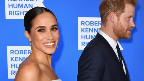 Getty Images Prince Harry, Duke of Sussex, and Megan, Duchess of Sussex, arrive for the 2022 Ripple of Hope Award Gala at the New York Hilton Midtown Manhattan Hotel in New York City on December 6, 2022.