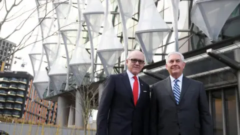 Reuters Rex Tillerson and US ambassador Woody Johnson