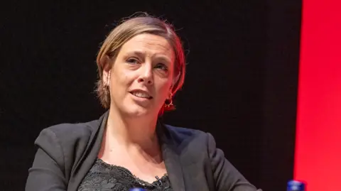 Getty Images Jess Phillips speaking at the Labour Party conference in 2023