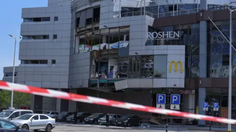 Damage caused by the missile strike in Dnipro