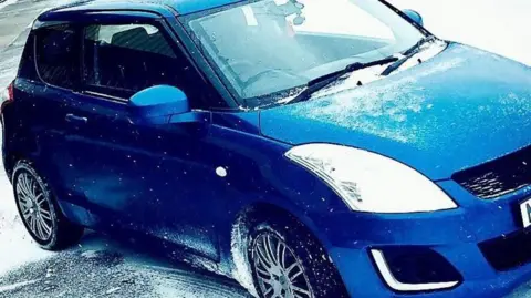 Marcus Johnson Marcus Johnson's blue Suzuki Swift seen in the snow