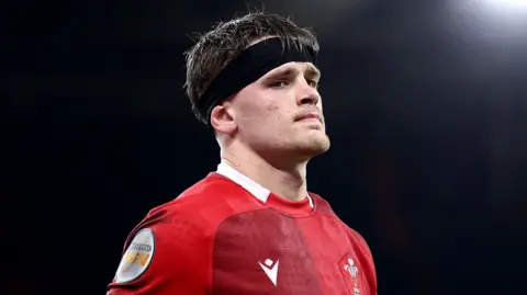 Alex Mann playing for Wales against Scotland