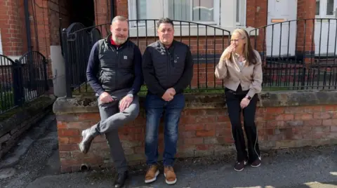 Sibilings Andre Keane and Caroline Keane-Hayes (left and right) and cousin Gerald Costello (centre) recreated their 50-year-old poses