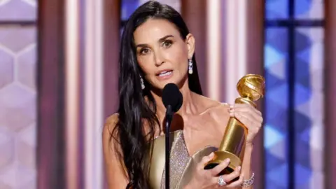 Demi Moore wins Best Performance by a Female Actor in a Motion Picture Musical or Comedy during the 82nd Annual Golden Globes held at The Beverly Hilton on January 05, 2025 in Beverly Hills, California