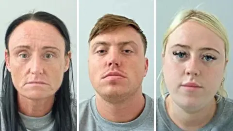 Lancashire Police Composite of Joanne Maxwell, Liam Donlin and Amie Clegg's mugshots. Maxwell has long, dark hair in a central parting, Donlin has short brown hair and stubble and Clegg had blonde hair tied back and big false eyelashes. All three are wearing grey t-shirts.