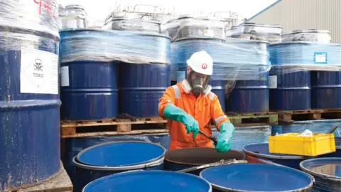 Veolia Man handling waste from Rothera research station