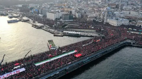 Getty Images Tens of thousands of participants gathered in mosques for morning prayers and march for Palestinians killed by Israeli attacks in Gaza, on 1 January 2024 in Istanbul, Turkey