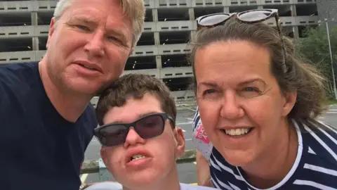 Fraser with parents Andrew and Karen