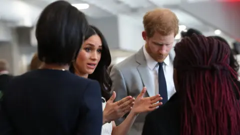 PA Prince Harry and Meghan Markle