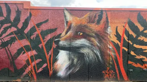 Oli Constable/BBC An orange fox painting