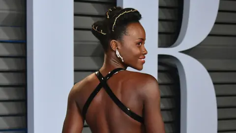 Getty Images Lupita Nyong'o attends the 2018 Vanity Fair Oscar Party hosted by Radhika Jones at Wallis Annenberg Center for the Performing Arts on March 4, 2018 in Beverly Hills, California.