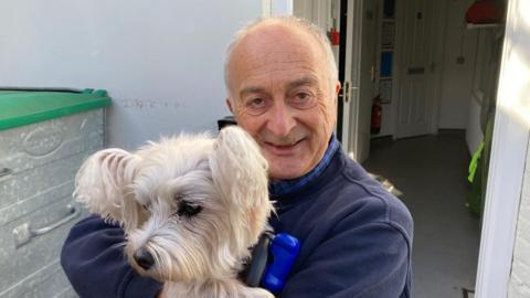 Sir Tony Robinson with his dog