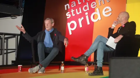 National Student Pride Sir Ian McKellen sits in an armchair opposite broadcaster Evan Davis, and speaks to the crowd
