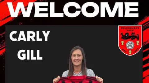 Carly Gill A social media illustrated post showing a female footballer holding up a red shirt