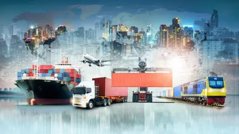 Getty Images A world map image featuring a ship, lorry, plane and train the foreground