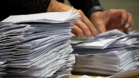 Getty Images Ballots being counted