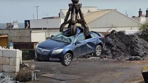 South Derbyshire District Council Car being crushed