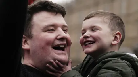 PA Media Máirtín and Dáithí Mac Gabhann in London