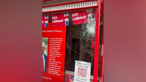 A cracked window in the offices of the Labour Party in Stroud.