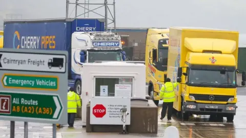 PRESS EYE/SHUTTERSTOCK Trucks passing through controls at Larne Harbour