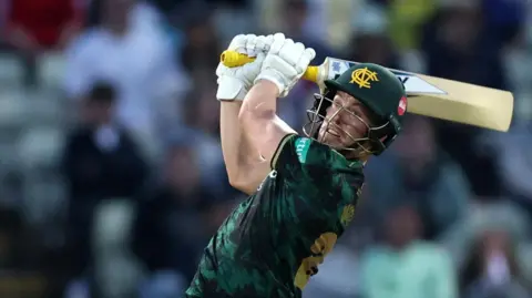 Tom Moores in action with the bat