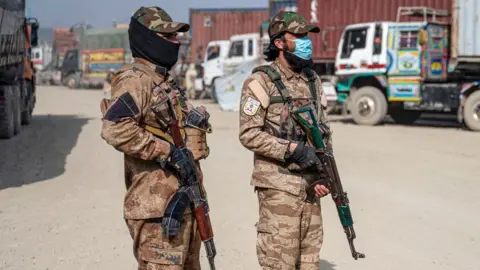 Getty Images Taliban guards at border check point