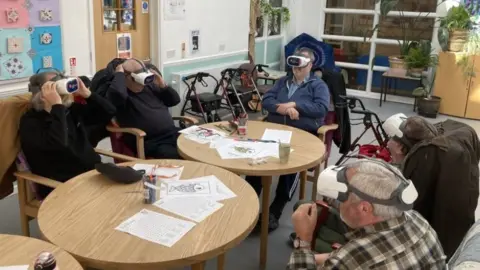 Residents with the VR headsets