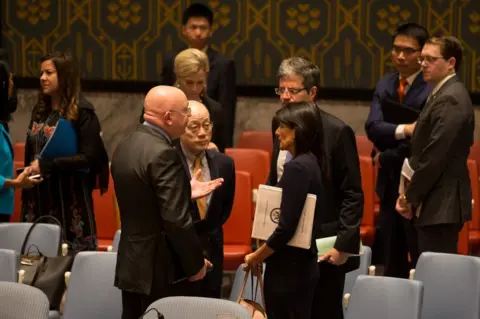 Reuters Russian ambassador to the UN Vasily Nebenzia (L) speaks to his China's Liu Jieyi (centre L), France's Francois Delattre (centre R) and Nikki Haley (R) of the US in New York, 4 September