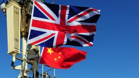 AFP UK and Chinese flags