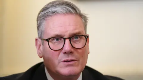 PA Media Closeup of Prime Minister Sir Keir Starmer looking worried during a reception at Downing Street