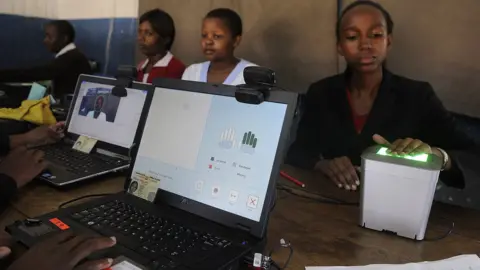 AFP Kenyans register as voters