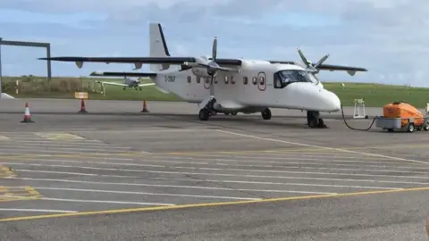 BBC A plane on the runway at Alderney Airport
