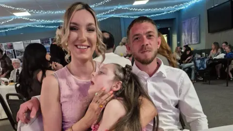 Catrin sat at an event with Eva Rae and her boyfriend. 