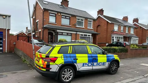 Police car outside a house in east Belfast